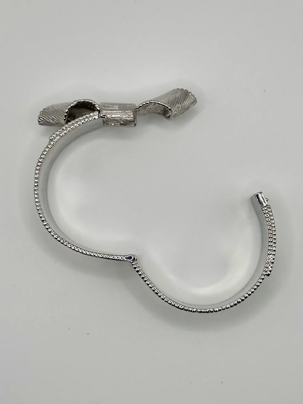 Kate Spade All Wrapped Up Textured Silver Tone Bow Bracelet Structured Bangle KS - Picture 7 of 8